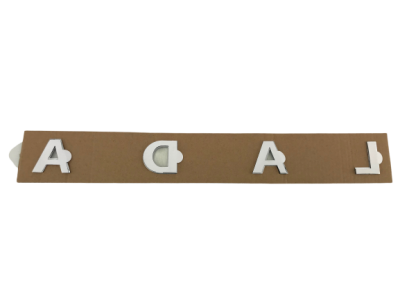 Эмблема задка на трафарете L A D A